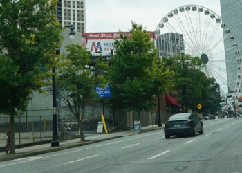 Billboard blocked by trees